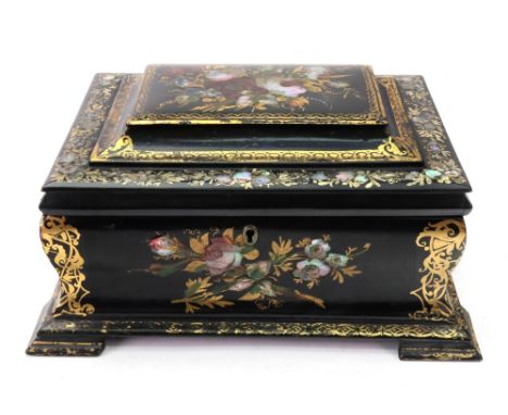 A Victorian rectangular black ground papier mache sewing box, painted with flowers, inlaid in mother of pearl and gilded, the