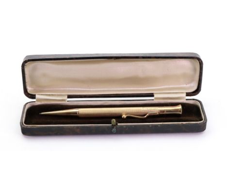 A cased 9ct gold engine turned 'The Mascot' propelling pencil, makers mark E.B., Birmingham 1937, 12cm long.