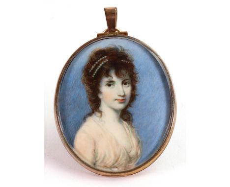 English School, circa 1795, A portrait miniature of a young lady wearing a pink dress and pearls in her hair, watercolour hei