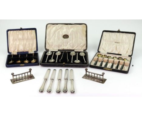 A cased set of six silver seal end teaspoons and sugar tongs, Sheffield 1927, cased set of four silver and blue guilloche ena