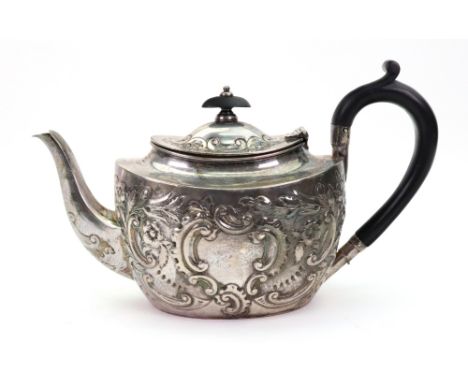 A batchelors George III style oval silver teapot, J.B. Carrington, London 1896, floral and 'c' scroll embossed, one cartouche