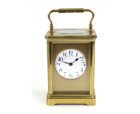 Goldsmiths &amp; Silversmiths Company; a large brass cased carriage clock, with lever platform escapement, striking on a gong