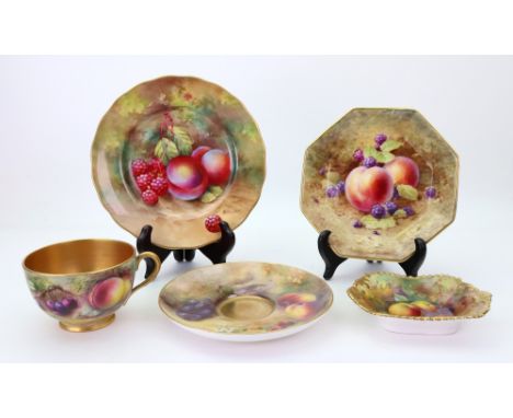 A group of Royal Worcester fruit painted porcelains, circa 1920-1940, comprising: a teacup and saucer, painted by S H Cole an