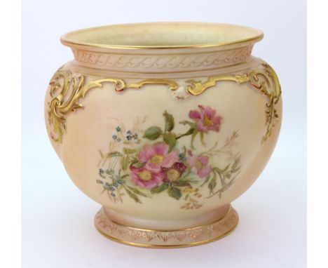 A Royal Worcester jardiniere, circa 1916, the wrythen moulded body decorated with groups of flowers against a shaded apricot 