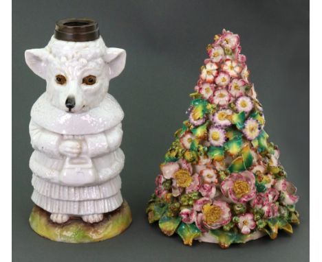 A German porcelain novelty lamp base, late 19th century, modelled as a standing fox dressed as a woman, 20.5cm high, a floral