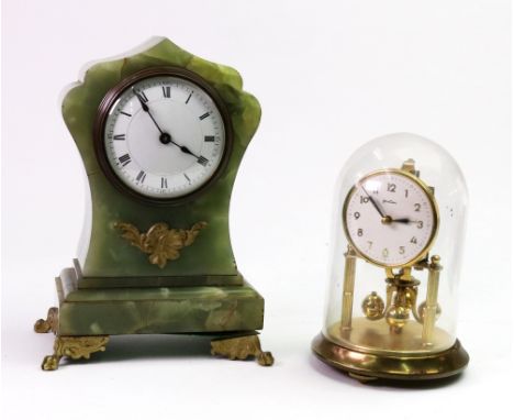An early 20th century French green onyx gilt metal mounted mantel timepiece, the shaped case with enamel dial and Roman numer
