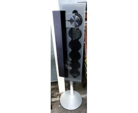 A Bang & Olufsen BeoSound 9000 CD HiFi system, six CD changer, together with one floor standing speaker, and another for wall