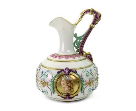 A Royal Worcester ewer, circa 1865, the squat bulbous body moulded each side with classical portrait medallions on a floral m