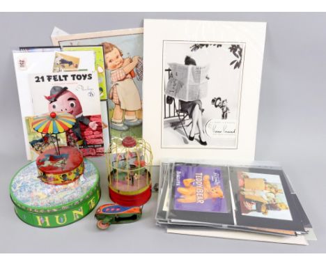 A Huntley & Palmer's peaceful summer's day traditional English garden biscuit tin, doll's boxed china tea service, various ot
