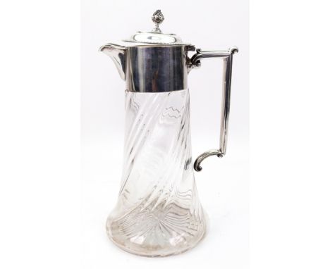A late Victorian silver mounted glass claret jug, William Hutton & Sons, London 1900, the domed hinged cover with a gadroon r