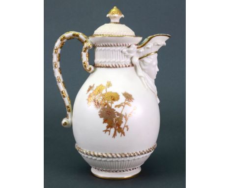 A Royal Worcester pear shape jug and cover, circa 1890, moulded with a female mask spout, the body decorated with gilt and ir