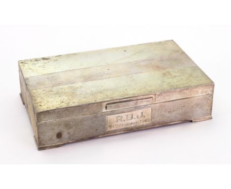 An Art Deco style engine turned rectangular silver cigarette box, makers mark B.G, Chester 1947, 14.5 cm x 9cm, inscribed.