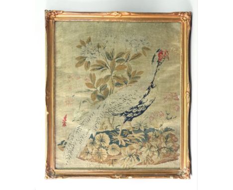 A pair of Victorian needlework pictures of pheasants amongst flowering branches, each 50 x 41.5cm, and a pair of brass two li