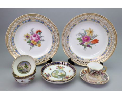 A group of continental porcelain, late 19th/20th century, comprising: a pair of Berlin pierced plates painted with flower bou