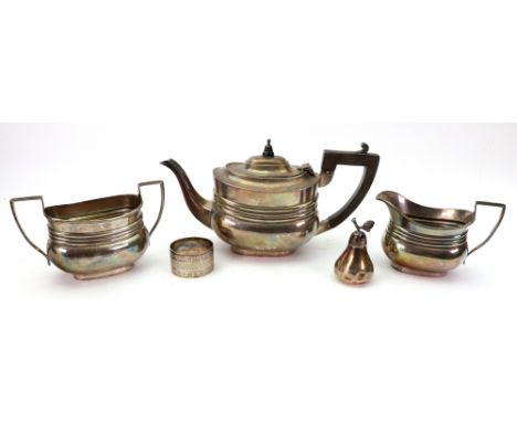 A batchelors Regency style three-piece silver tea service, Chester 1908 and Birmingham 1911 & 1915, of rounded oblong form, t