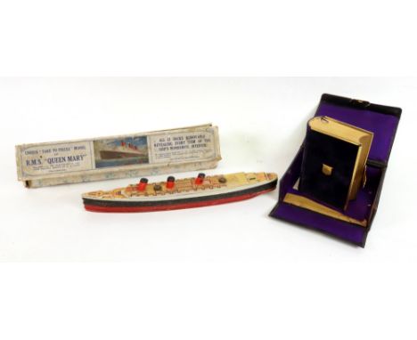 Unique 'take to pieces' model of R.M.S Queen Mary, by Chad Valley, in original box and a Victorian purple velvet covered gilt