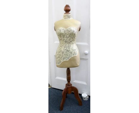 A late Victorian papier mache and wood mannequin, approx 150cm tall.