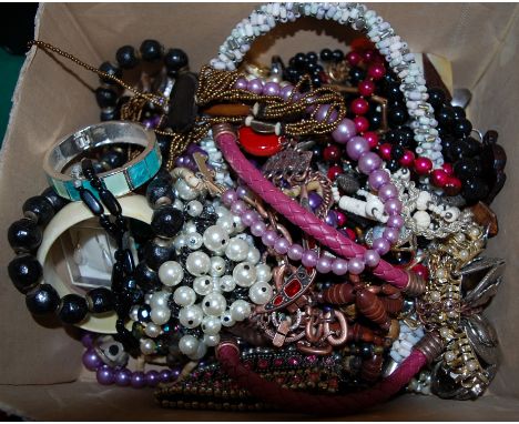 A box of miscellaneous ethnic and other costume jewellery, to include faux pearl bracelet etc.