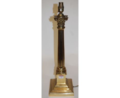 A 20th century brass corinthian column table lamp base, height 56cm
