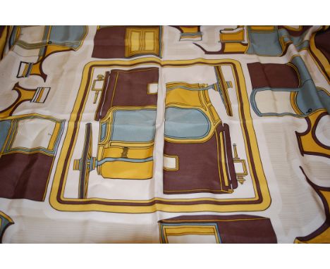A ladies Hermès silk scarf   Condition Report / Extra Information  No rips or tears.Requires cleaning to remove 4/5 dirty mar