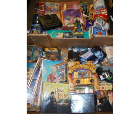 Two boxes of assorted Harry Potter related toys and accessories to include; Half-Blood Prince trading cards, Sorcerer's Stone