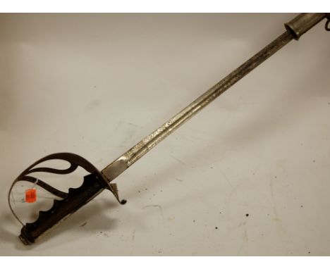 A European court sword,  the 79cm blade etched with various foliage having a pierced steel hilt and wooden grip in steel scab