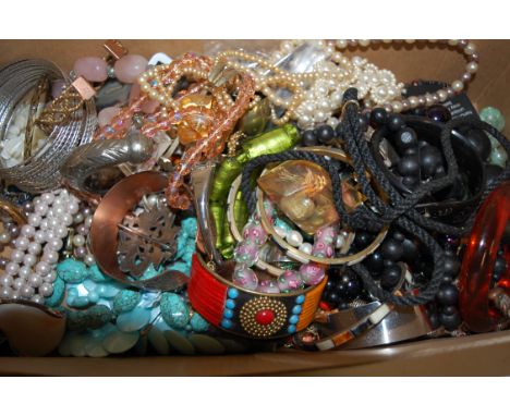 A box of miscellaneous costume jewellery to include ladies bangles, faux pearl necklace, bead necklaces etc