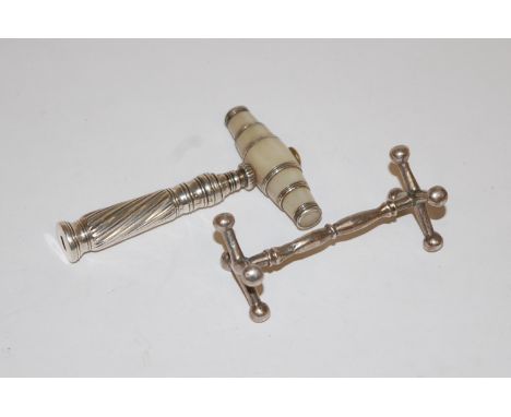 A white metal and mother of pearl handled travelling corkscrew; together with a silver cutlery rest (2)    Condition Report /