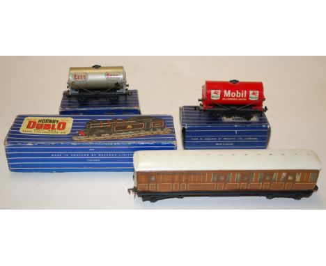 A boxed Hornby Dublo OO gauge tank locomotive BR, together with a Hornby Dublo petrol tank wagon D1 Esso, goods brake van, et