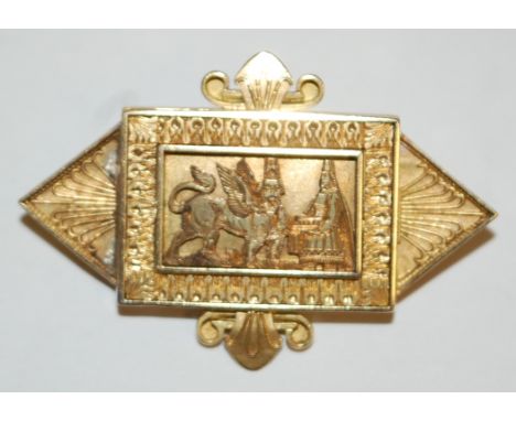 A yellow metal Egyptian Revival brooch, having watercolour portrait inset back    Condition Report / Extra Information  4.4cm