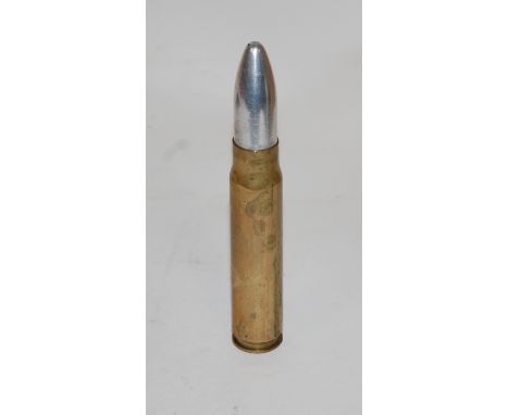 A WWII 20mm shell case lighter, dated 1942