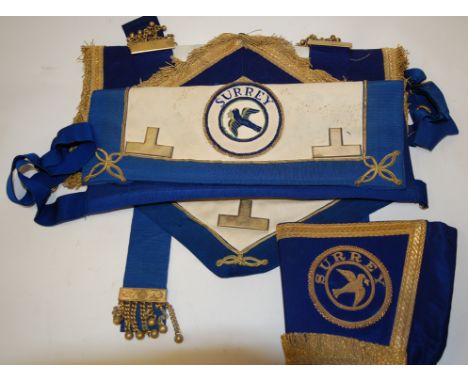 A Masonic apron, sash and regalia for the Surrey Lodge, in fitted leather case, together with various other masonic sashes et