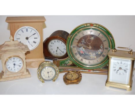 A 1920s green lacquered and chinoiserie decorated mantel clock together with a brass cased carriage clock, and various other 