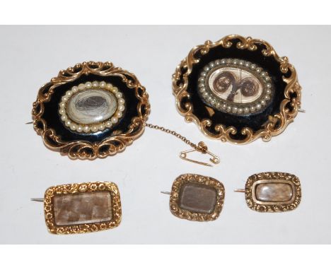 Five various 19th century yellow metal mourning brooches, each with yellow metal backs, to include two seed pearl and jet set