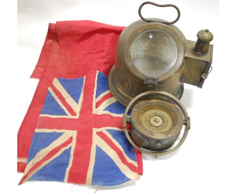 A brass cased ship's compass bearing a label 'Manufactured by Kelvin Bottomley & Bard Ltd, 16-20 Cambridge Street, Glasgow', 