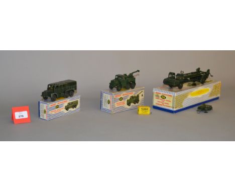 Three boxed Dinky Supertoys military vehicle diecast models, 661 Recovery Tractor, 666 Missile Erector Vehicle, missing the m
