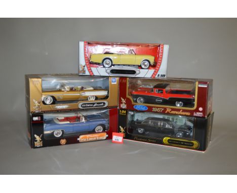 Three boxed 'Road Signature' 1:18 scale diecast models, a 1953 Packard Caribbean, a 1958 Pontiac Bonneville and a 1958 Cadill