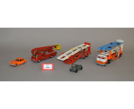 A small group of unboxed diecast models by Corgi and Dinky including a  Corgi 345 MGC GT model in orange, (only found in car 