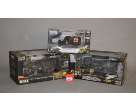 Three Unimax Forces of Valor 1:32 scale US military diecast models: M142 High Mobility Artillery Rocket System; 2.5 Ton Cargo