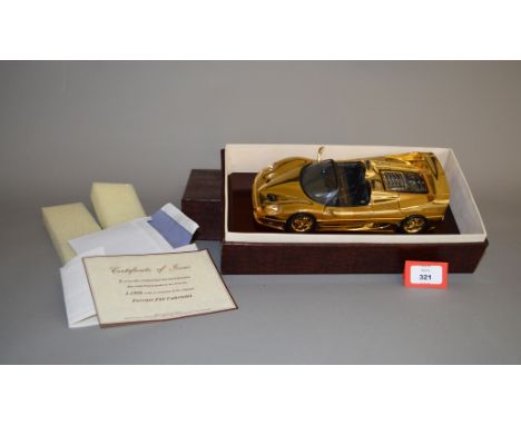 A boxed Gwilo International Ferrari F50 Cabriolet diecast model in 1:18 scale with 'Certificate of Issue' stating it to be a 