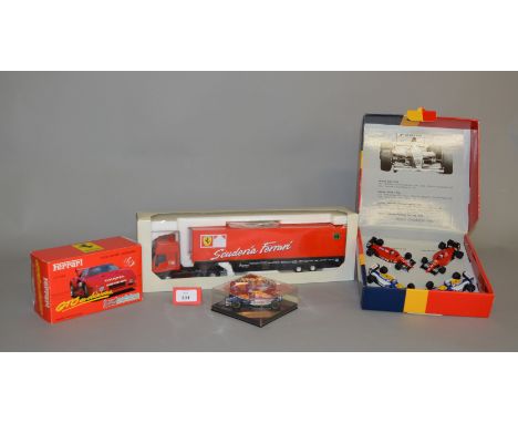 Three boxed Ferrari related diecast models in 1:43 scale including a Jouef Ferrari GTO, an Onyx 'Mansell World Champion 1992'