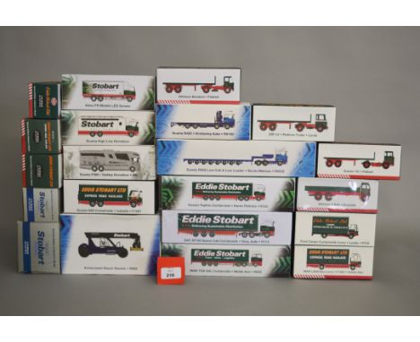 Twenty one boxed Eddie Stobart diecast models in 1:76 scale produced by Atlas Editions including van, truck and excavator mod