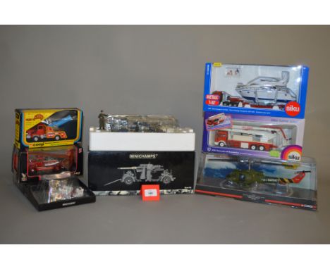 Seven boxed diecast models by Corgi, Minichamps and others including two Fire Engine models, one by Siku in 1:55 scale, a 'Ro