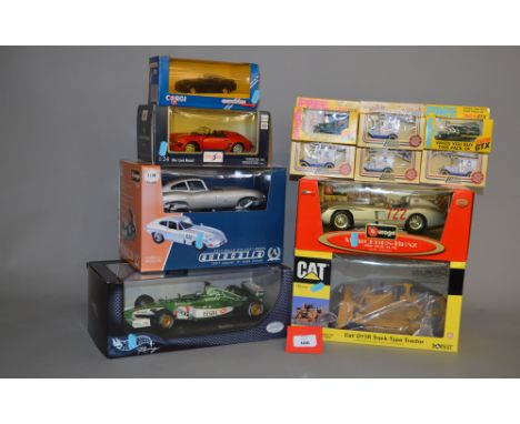 Seven diecast models, mostly larger scale: Bburago 1:18 Jaguar E Type Coupe; Norscot 1:50 Cat D11R Track-type Tractor; Hot Wh