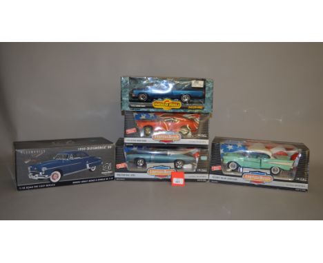 Five boxed ERTL diecast model cars in 1:18 scale from their 'American Muscle Collectibles' range including a 1969 Pontiac GTO