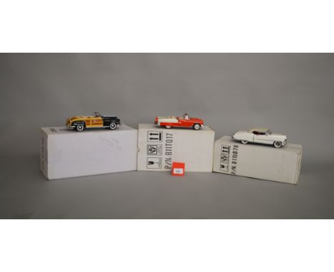 Three boxed Franklin Mint diecast models in 1:24 scale, a 1948 Chrysler Town and Country Woody, a 1955 Chevrolet Bel Air and 