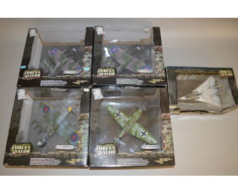 Four Unimax Forces of Valor 1:32 scale diecast aircraft, together with another in 1:72 scale. E and boxed. (5)