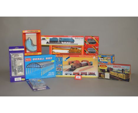 OO Gauge. A boxed Hornby R1031 'My first Hornby' battery operated train set together with various other boxed and carded rail