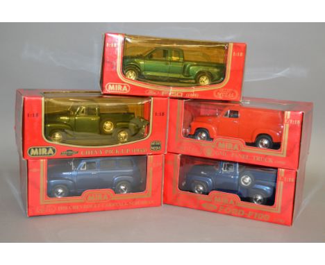 Five Mira 1:18 scale diecast model cars: 1950 Chevrolet CarryAll Suburban; 1956 Ford F100; 1950 GMC Panel Truck; 1953 Chevy P