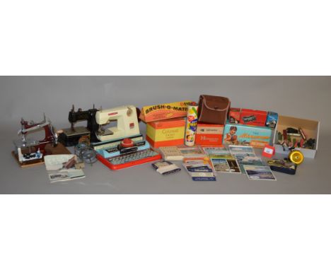 A mixed lot of assorted toys, to include: Mettoy Minor typewriter; View-Master; Microscope; Sewing Machine; Gyroscopes; etc.